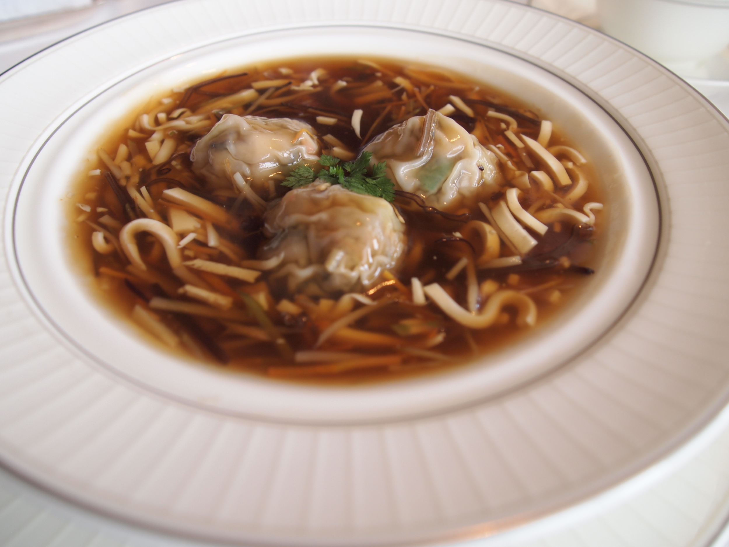 Vegetarian hot and sour tofu soup with wontons at Lung King Heen.&nbsp;