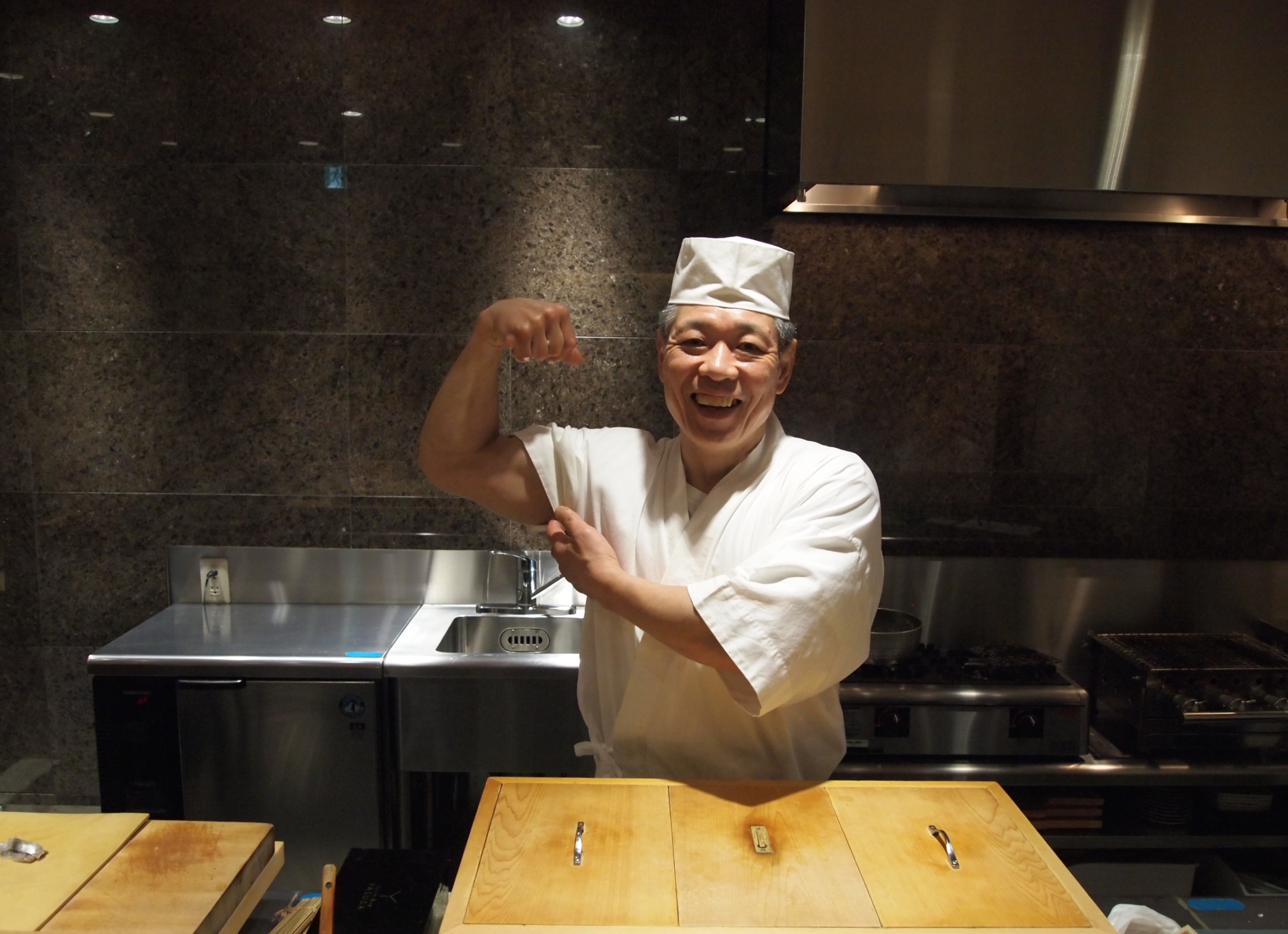  Tokyo.&nbsp;Sitting at the  eight-seat sushi bar  manned by Chef Yasuda, one of the world's most famous sushi chefs. 