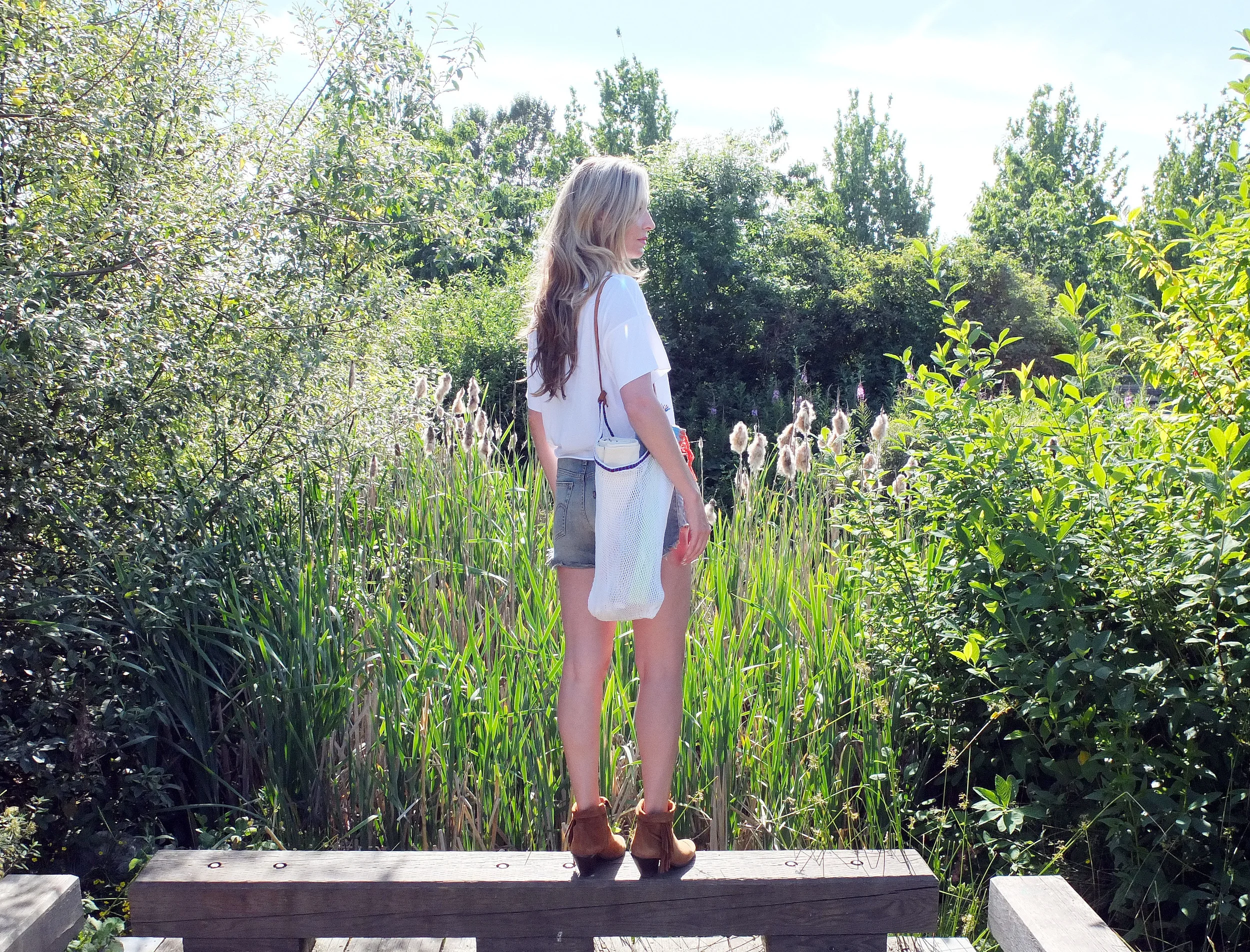 Wearing: Tulum Beach-Weave Bag in White // $39