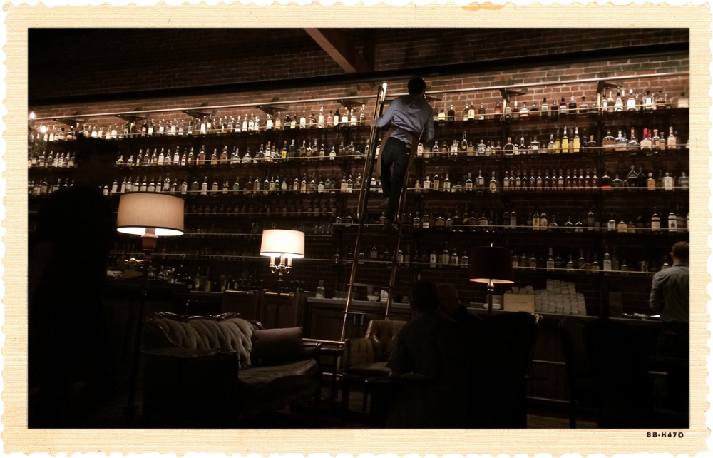 "I have many leather-bound books and my apartment smells of rich mahogany." I couldn't help but quote Ron Burgundy while sitting in a tufted leather couch in the Multnomah Whiskey Library . As I watched bar-backs climb rolling ladders like Belle in Beauty and the Beast to access one of the 1,500 bottles of liquor, including 900 whiskeys, I marveled at the attention to detail and spectacle of the place.