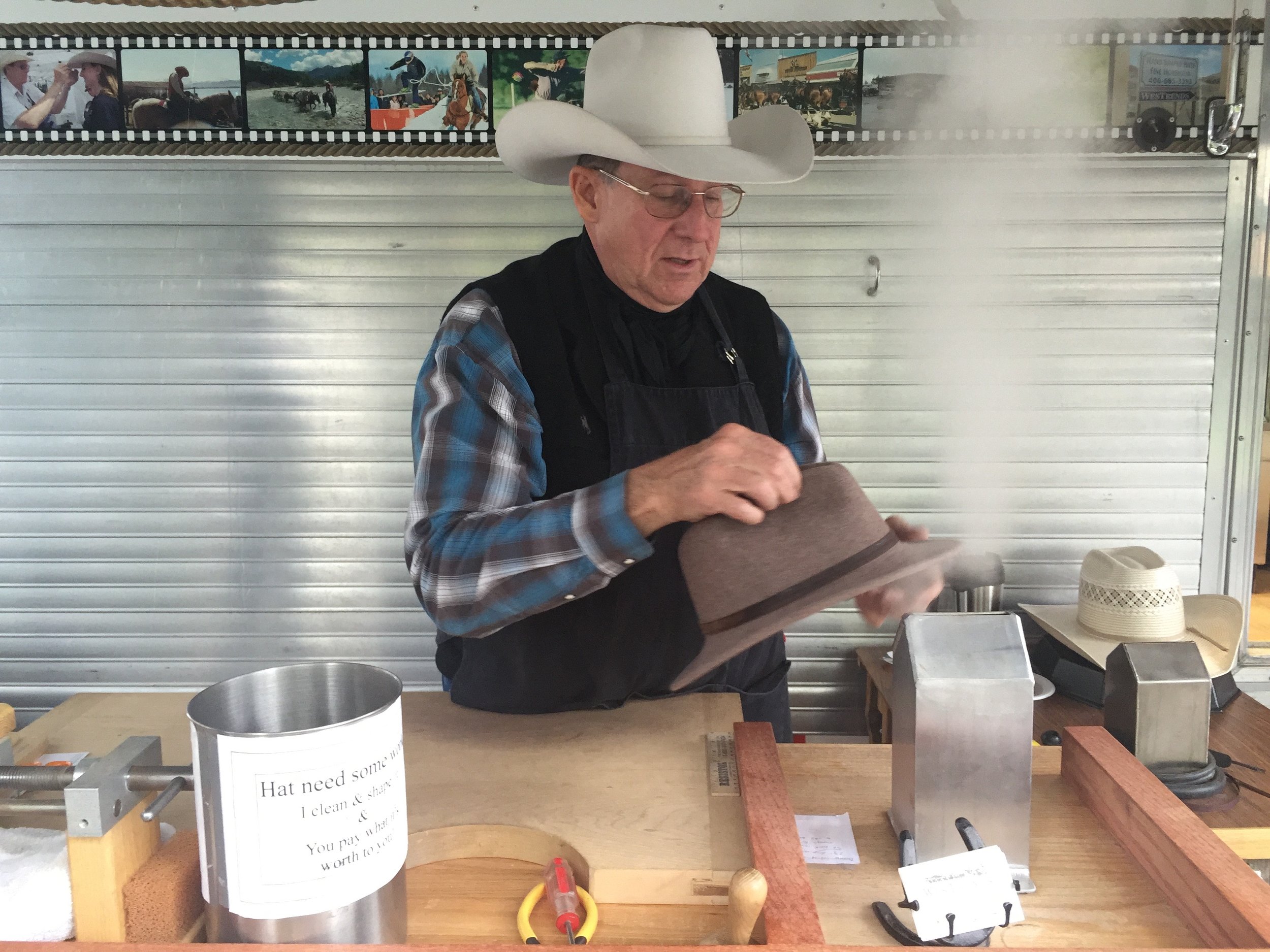  "When in Rome." At the ranch I purchased an authentic Stetson felt hat. This fine gent sized it to my head with steam and a steady hand.&nbsp; 