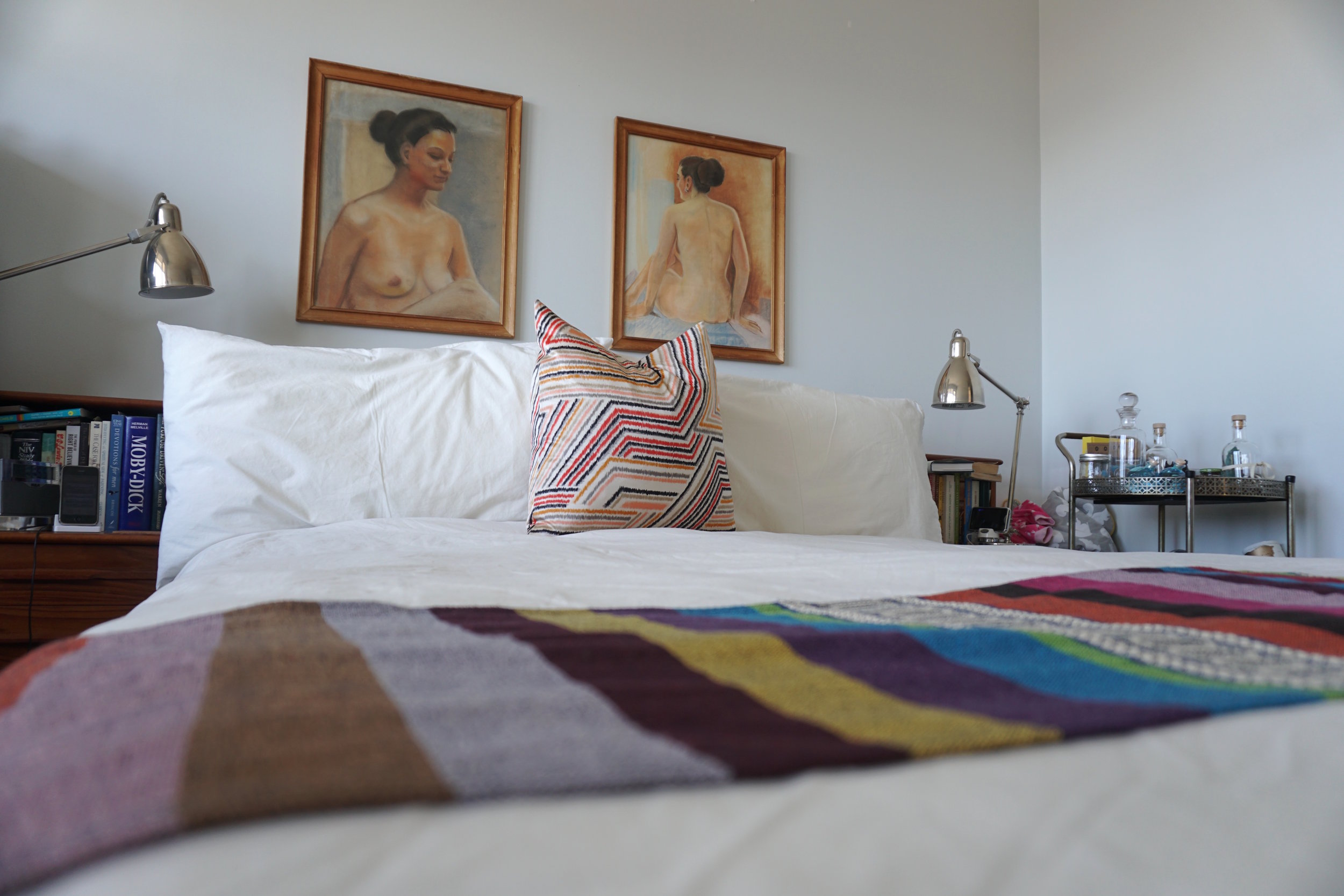 Our bedroom, complete with a Trip Styler Store Mexican throw and artwork my gram painted in the '50s at art school in California