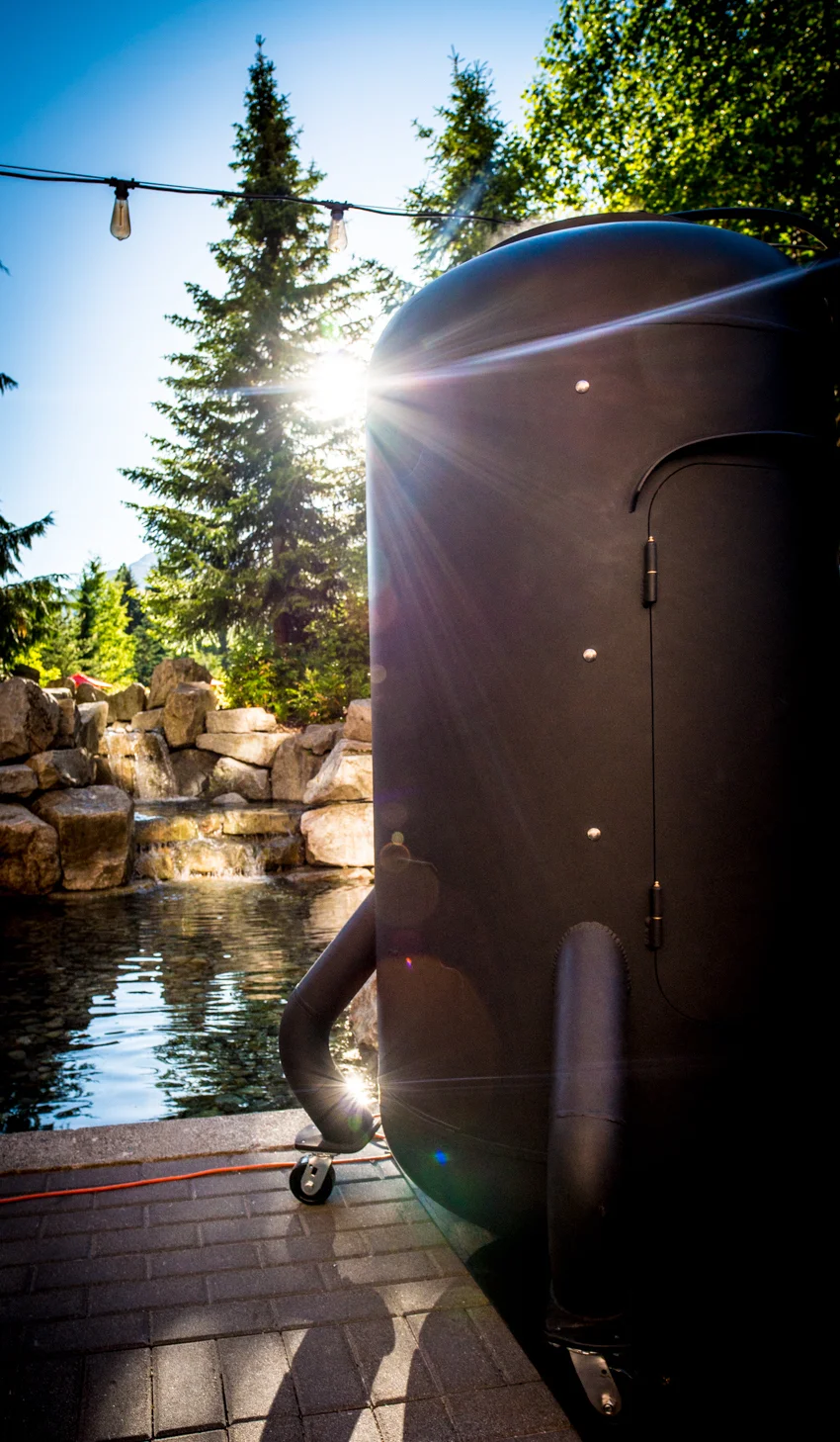  The custom-build meat smoker, which is taller than Mr. Trip Styler who stands at just over six feet.  Photo by: Reactive Design Inc. &nbsp; 