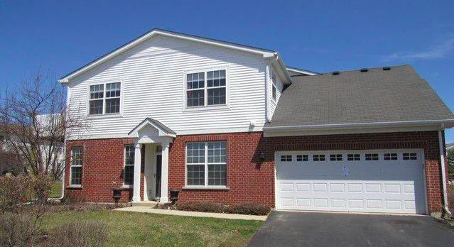 The new house. The lower level (and garage) are mine. The upper level is a separate unit.