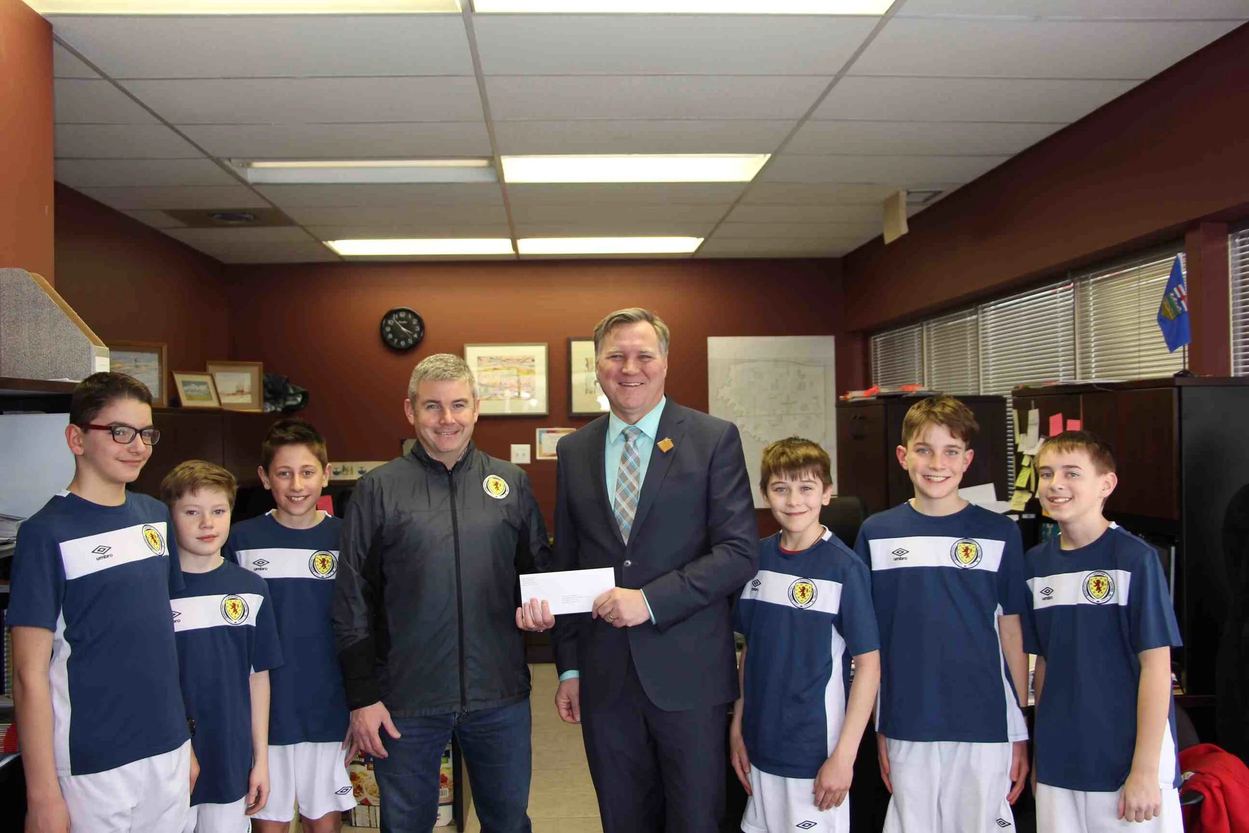 Our U12 Boys and Coach Holt at the Presentation Ceremony with MLA Richard Feehan