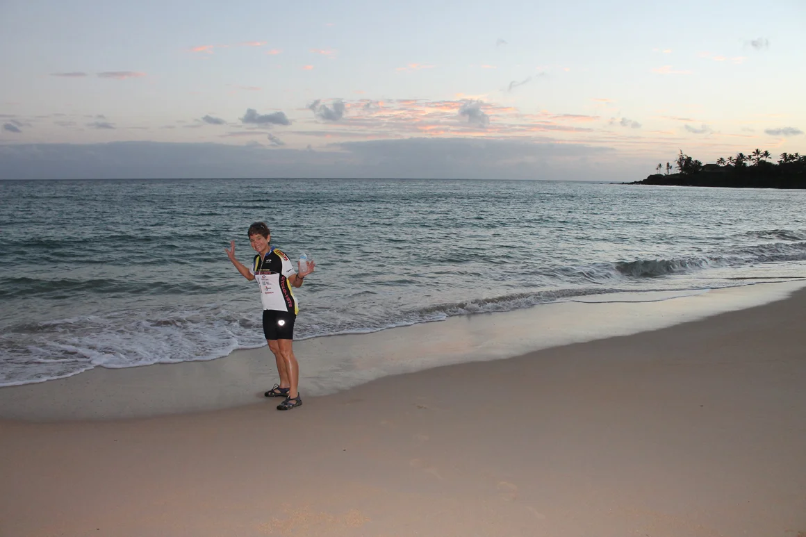 Ellen dipping her toe into the Pacific Ocean early in the morning before the ride on 7/31/2014.