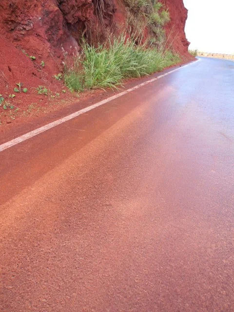 Often after night time rains the hillsides wash onto the roads, leaving a very slick thin layer of Maui clay. Use caution. 