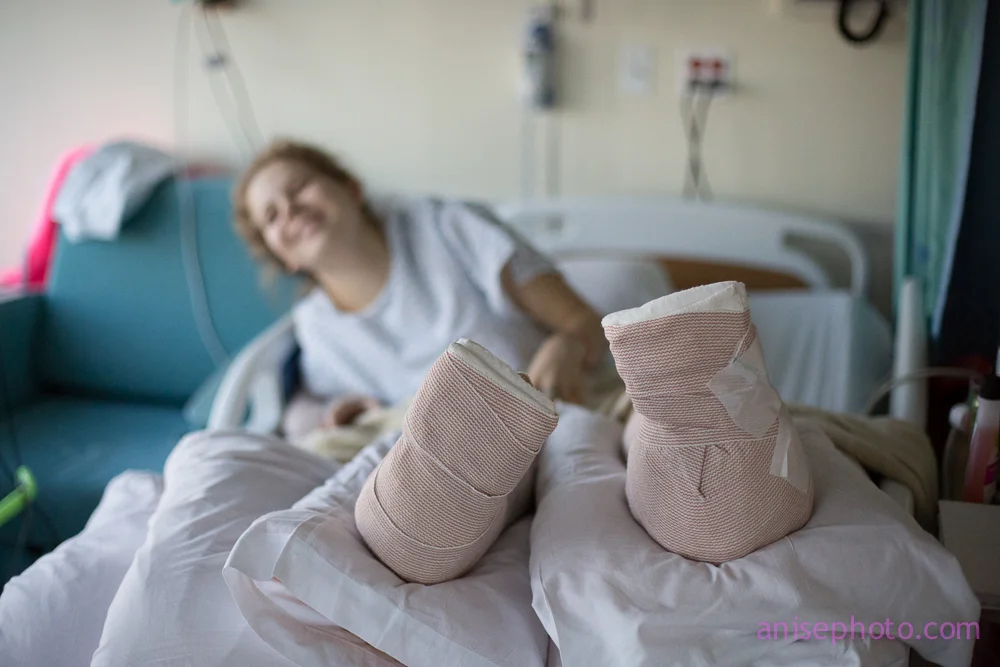 I flew back to NYC to surprise miss robin at her graduation from high school... and instead spent the afternoon with her in the hospital. She had shattered both of her heels after falling from a fire escape a few days before my arrival. 