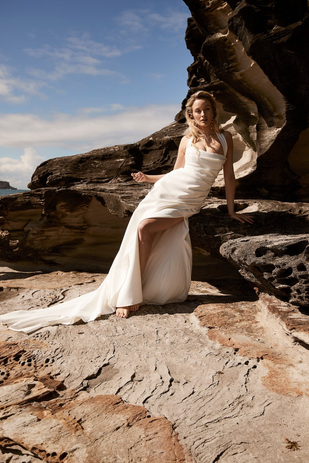 The Adelite Bridal Dress with Relaxed Mermaid Shape and Draped Overlay - Edited.jpg