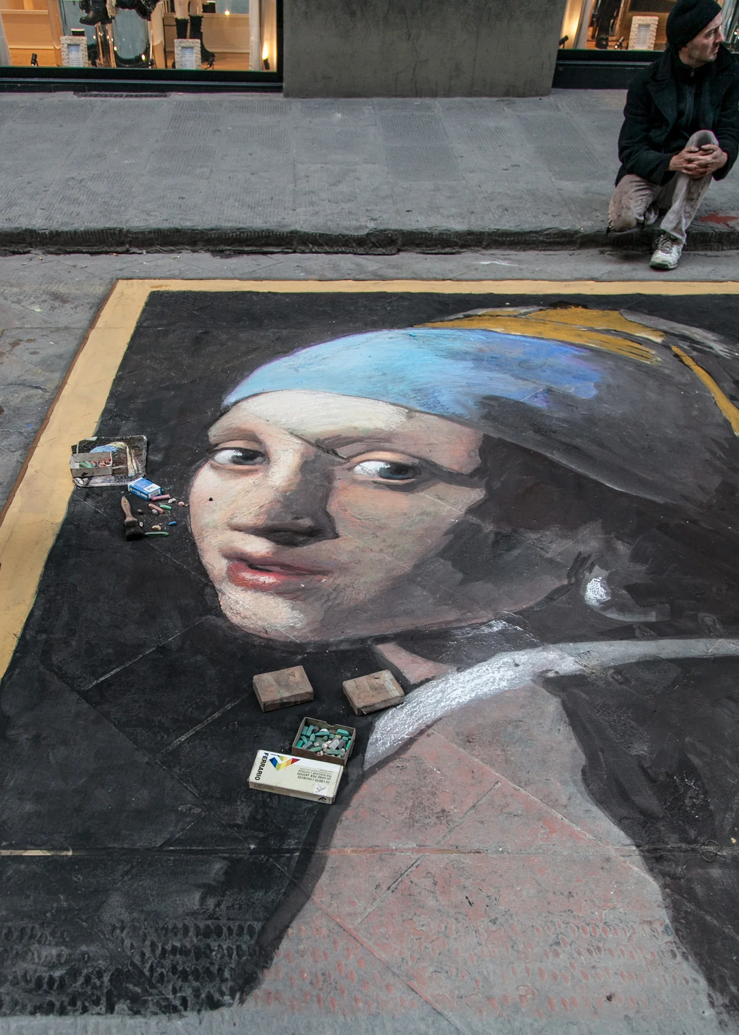 Street artists are everywhere in Florence....one of many...i hope they don't get rained on.