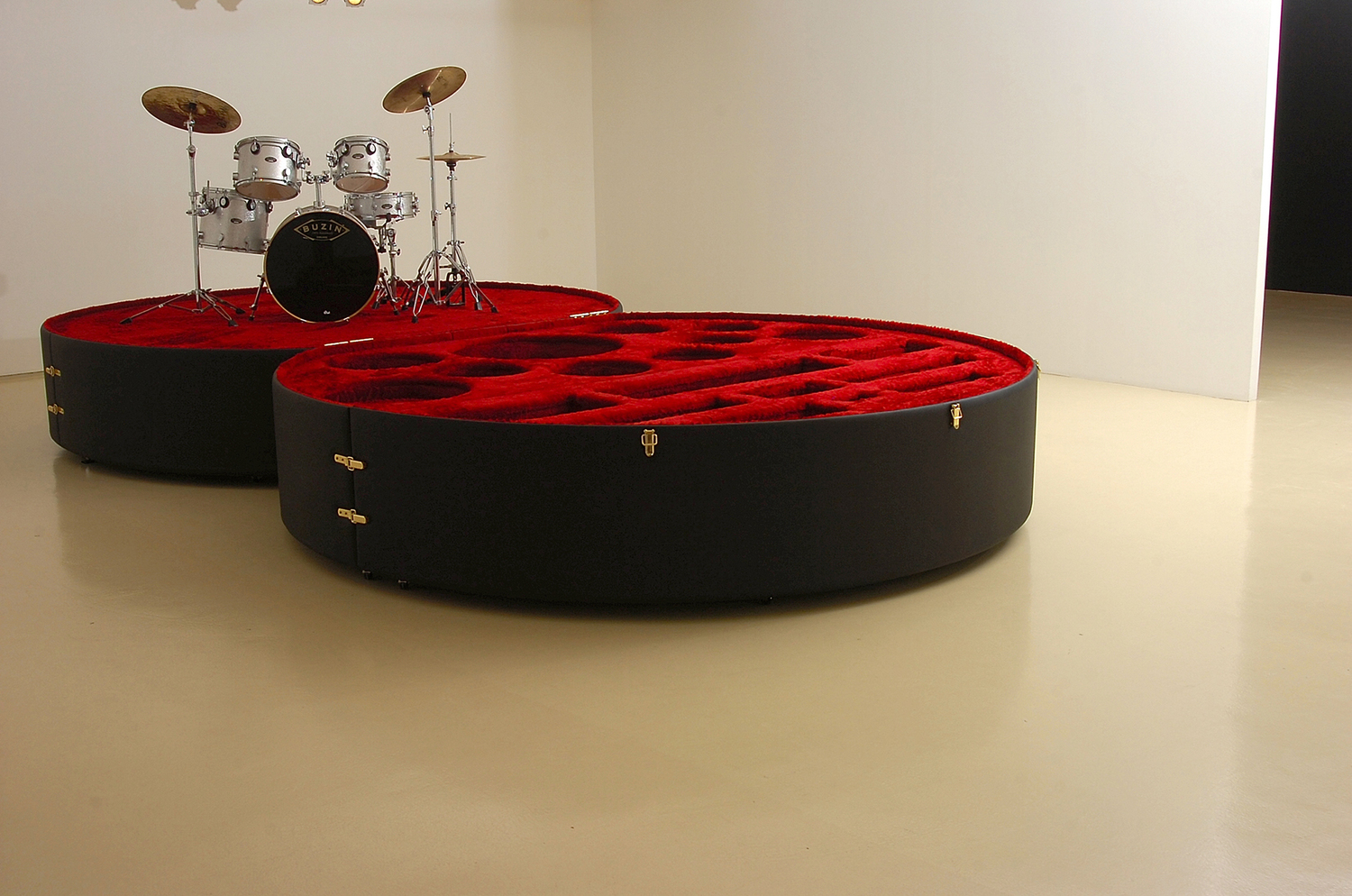 Twilight (Drum Case), 2006 Mixed media with drum kit and glass, 2.3' x 9.8' x 19' (Exhibited at Herzliya Museum of Art and Art Focus 5, curated by Ami Barak and Bernard Blistene)