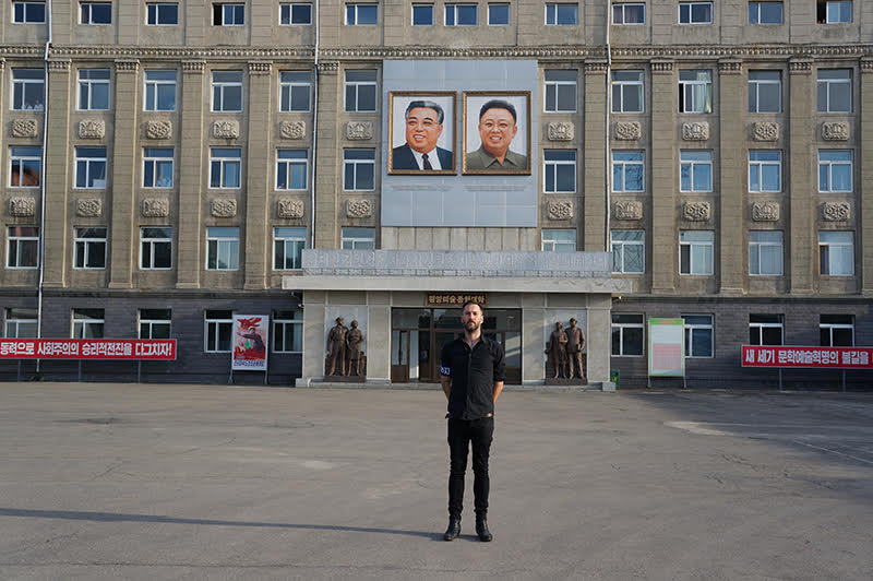 Nik Nowak in front of the University of Arts, Pjönjang // Courtesy Nik Nowak