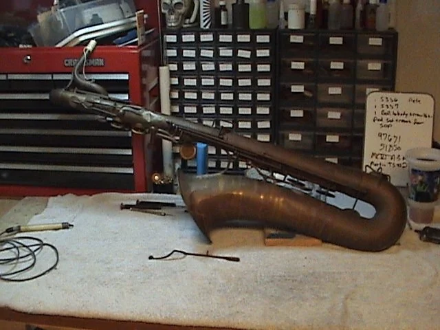 01-BarnardRepair_AdolpheSax-Baritone-Side_before.jpg