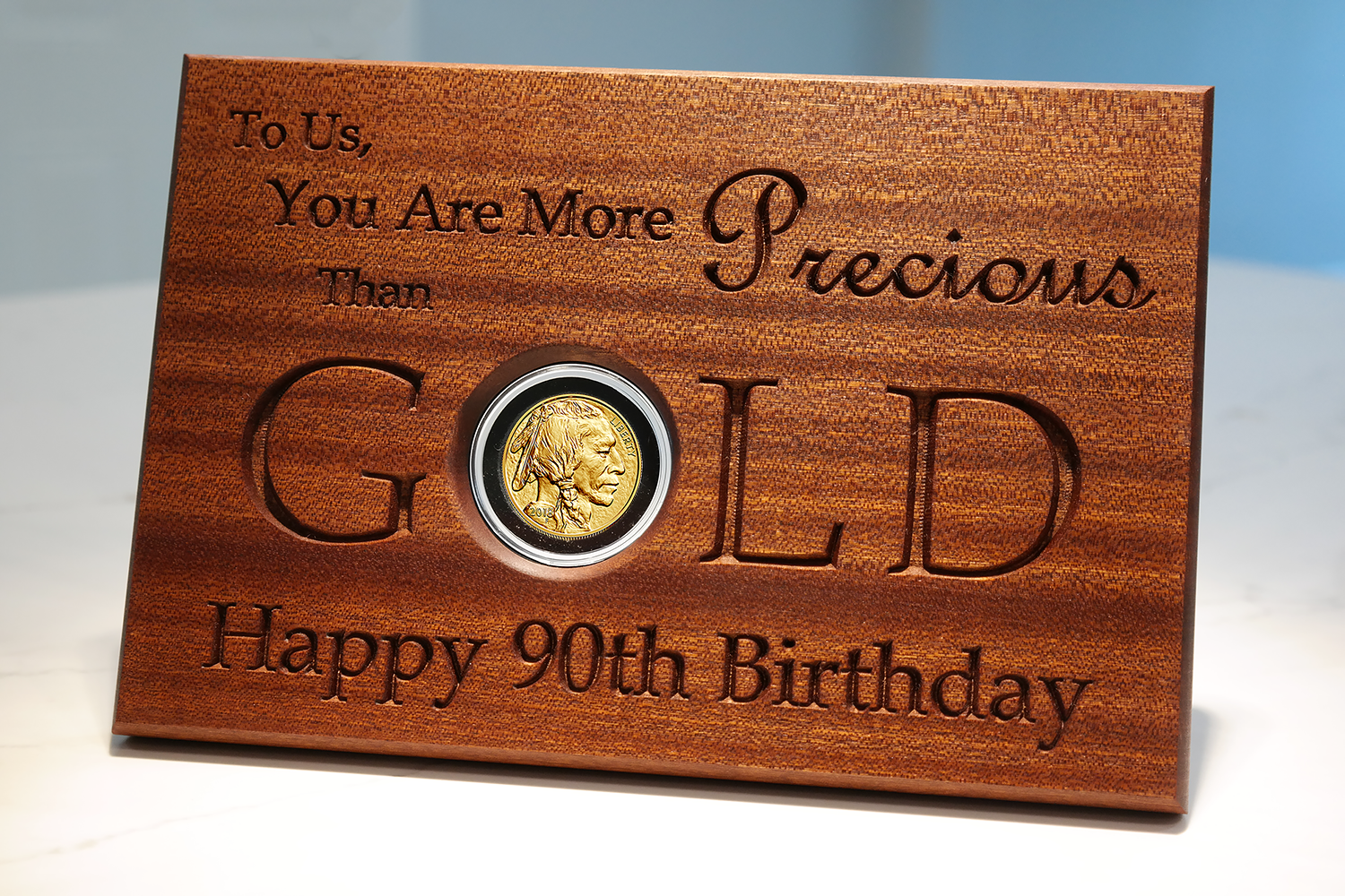 tilt-coin-display-sapele-gold.png
