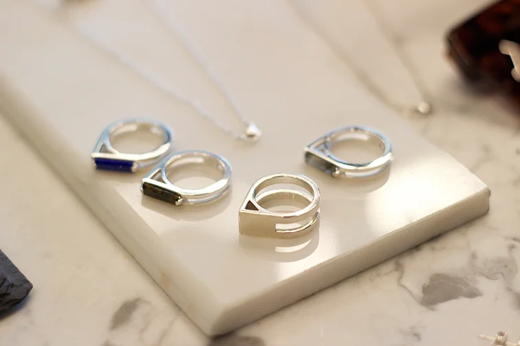 AEA Ribbon rings in sterling with lapis, pietersite and labradorite $355 each sz.7. AEA Triangle ring in sterling $150 sz.6