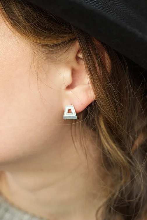 AEA Bond earring in sterling with white enamel $195