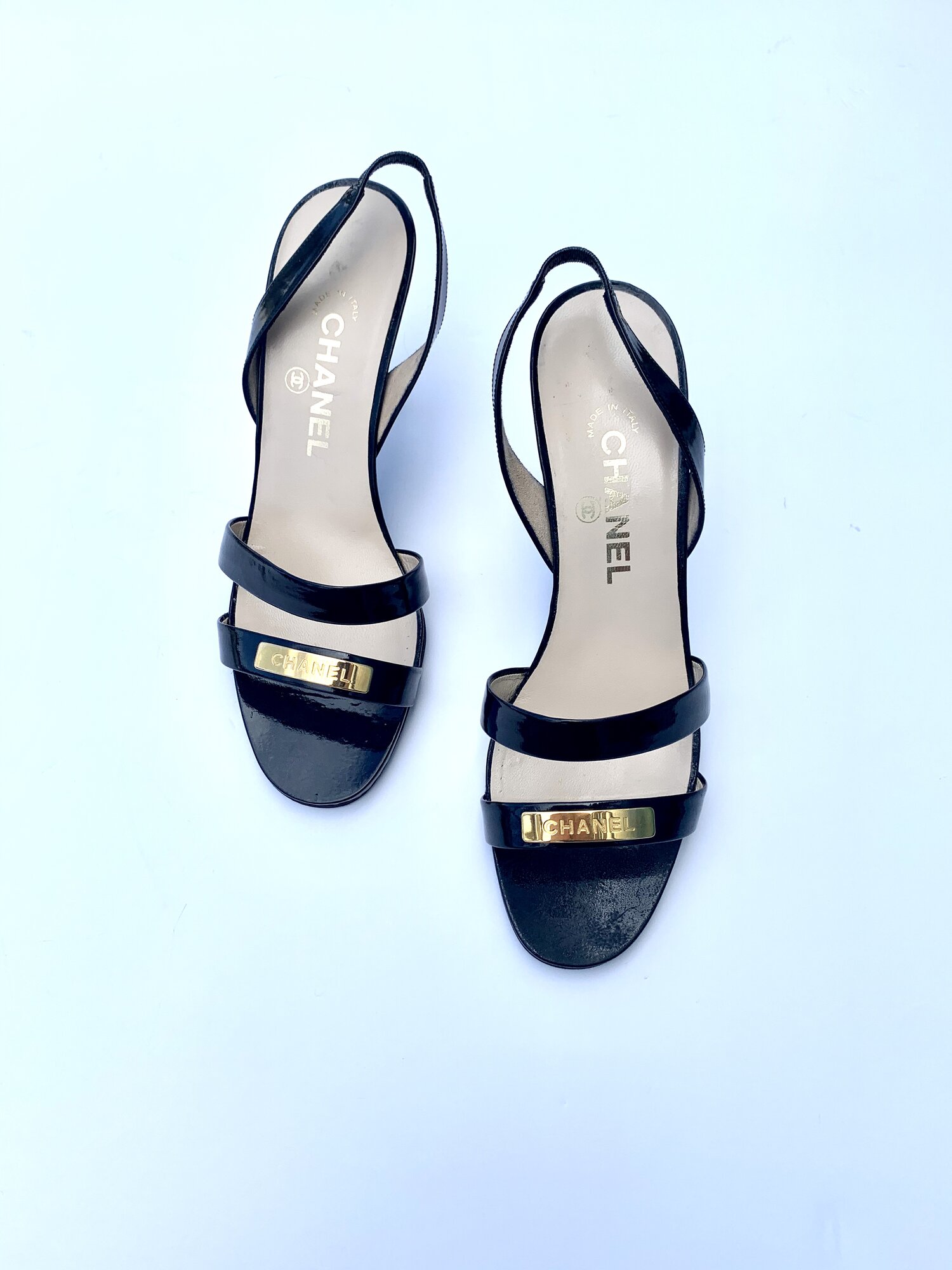 CHANEL 90s Black Gold Logo Plate Sandal — Garment