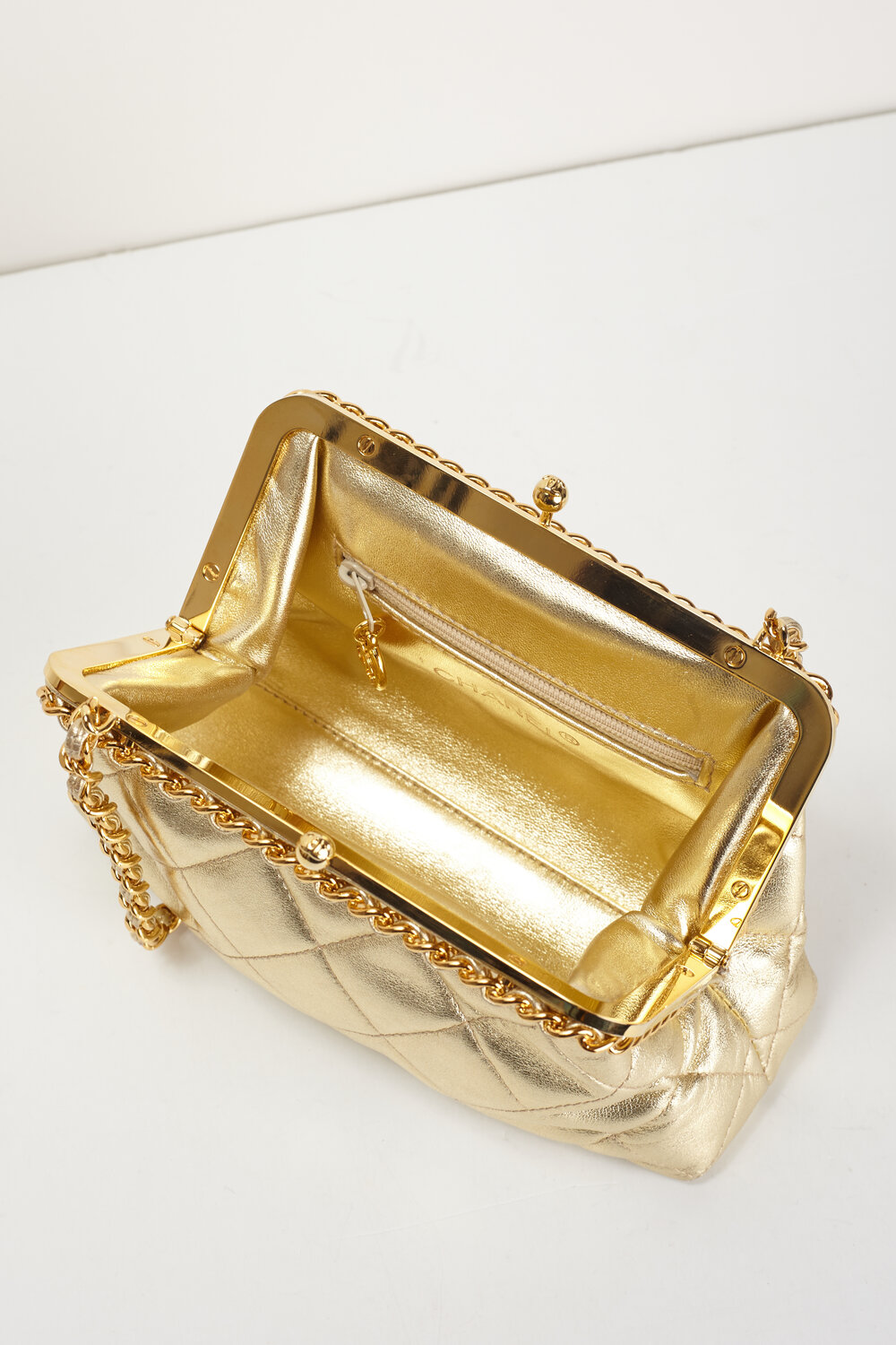 CHANEL 1994-1996 Gold Kiss Lock Evening Bag — Garment