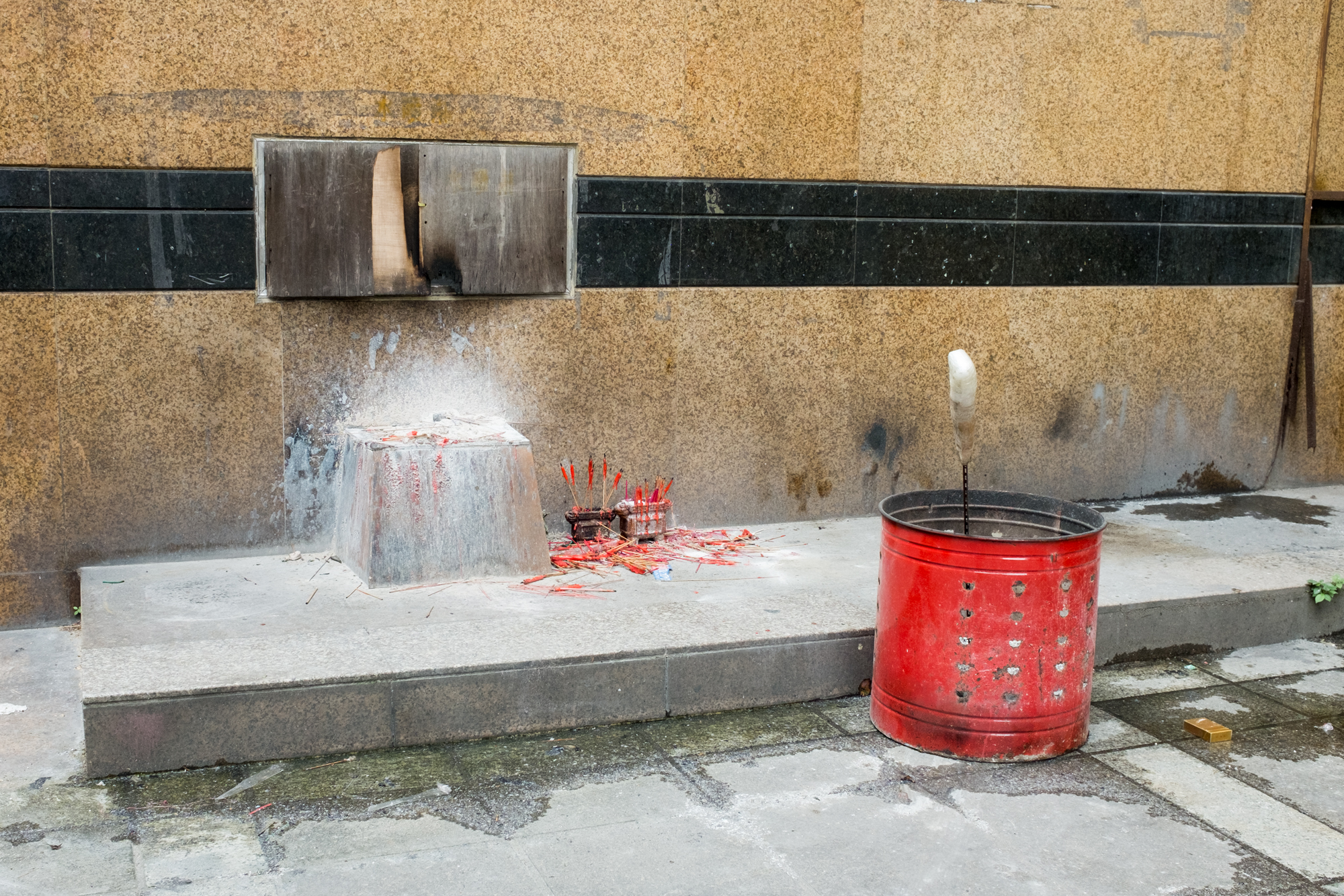 Burnt Incense near Buddhist Temple