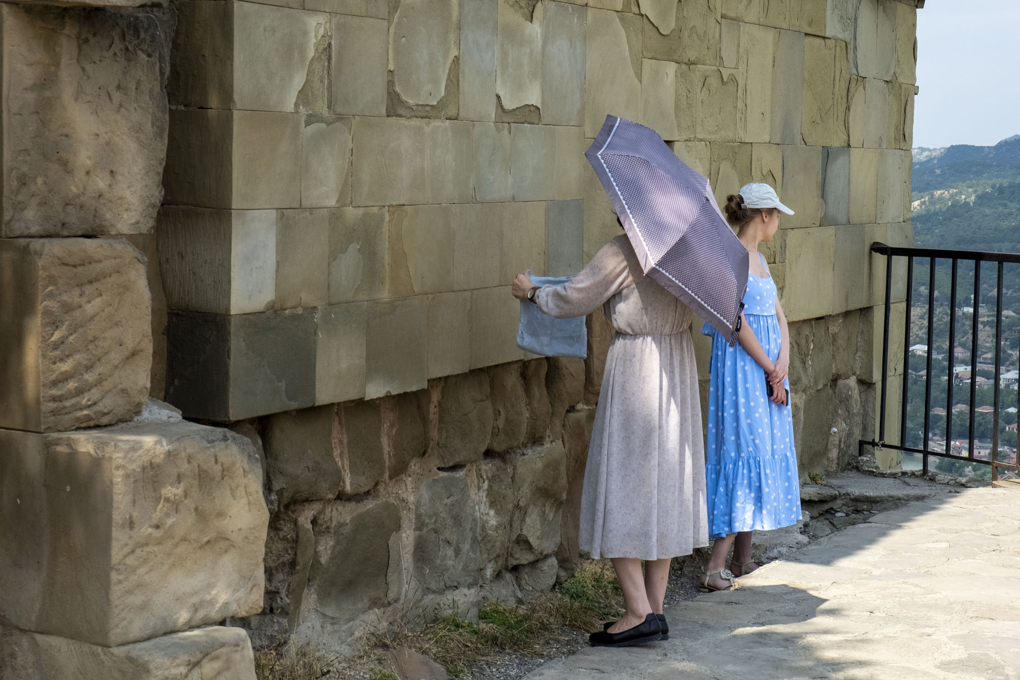 2 women in front of stone church.jpg