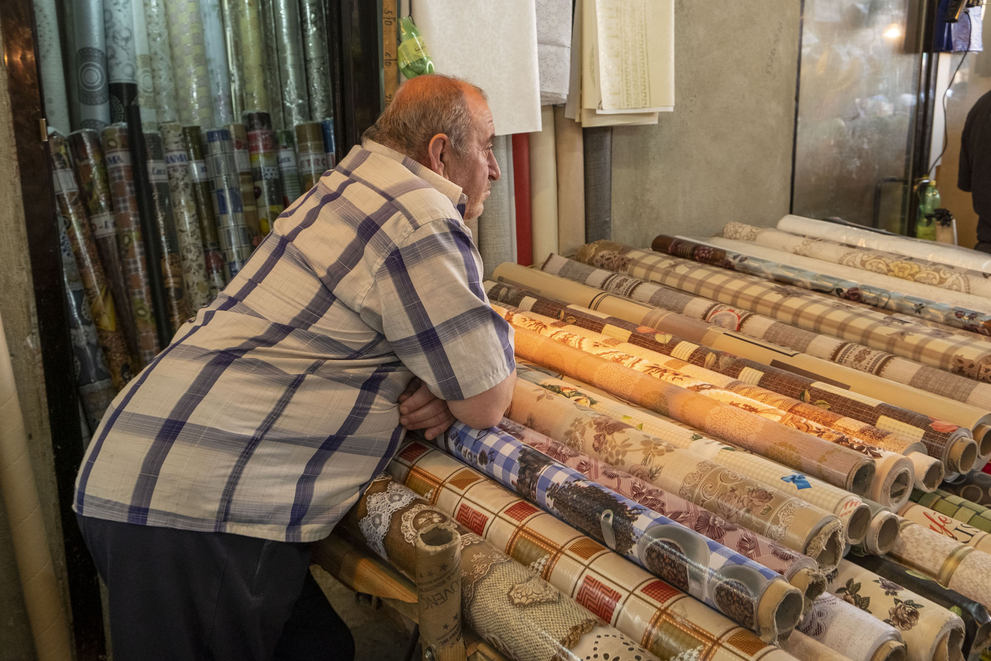 man selling oilcloth.jpg