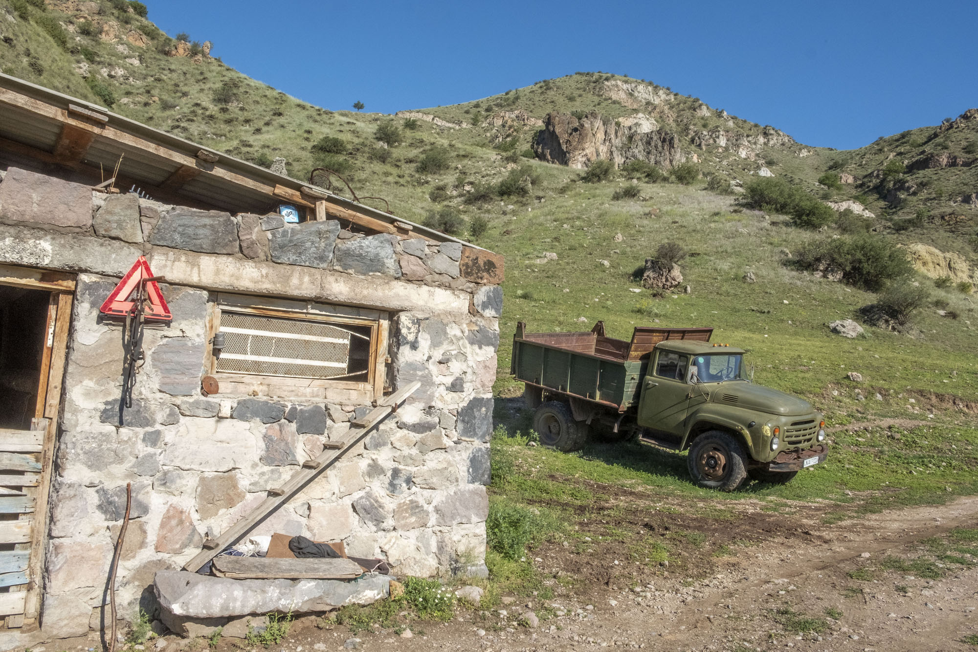 stone barn and russian truck.jpg