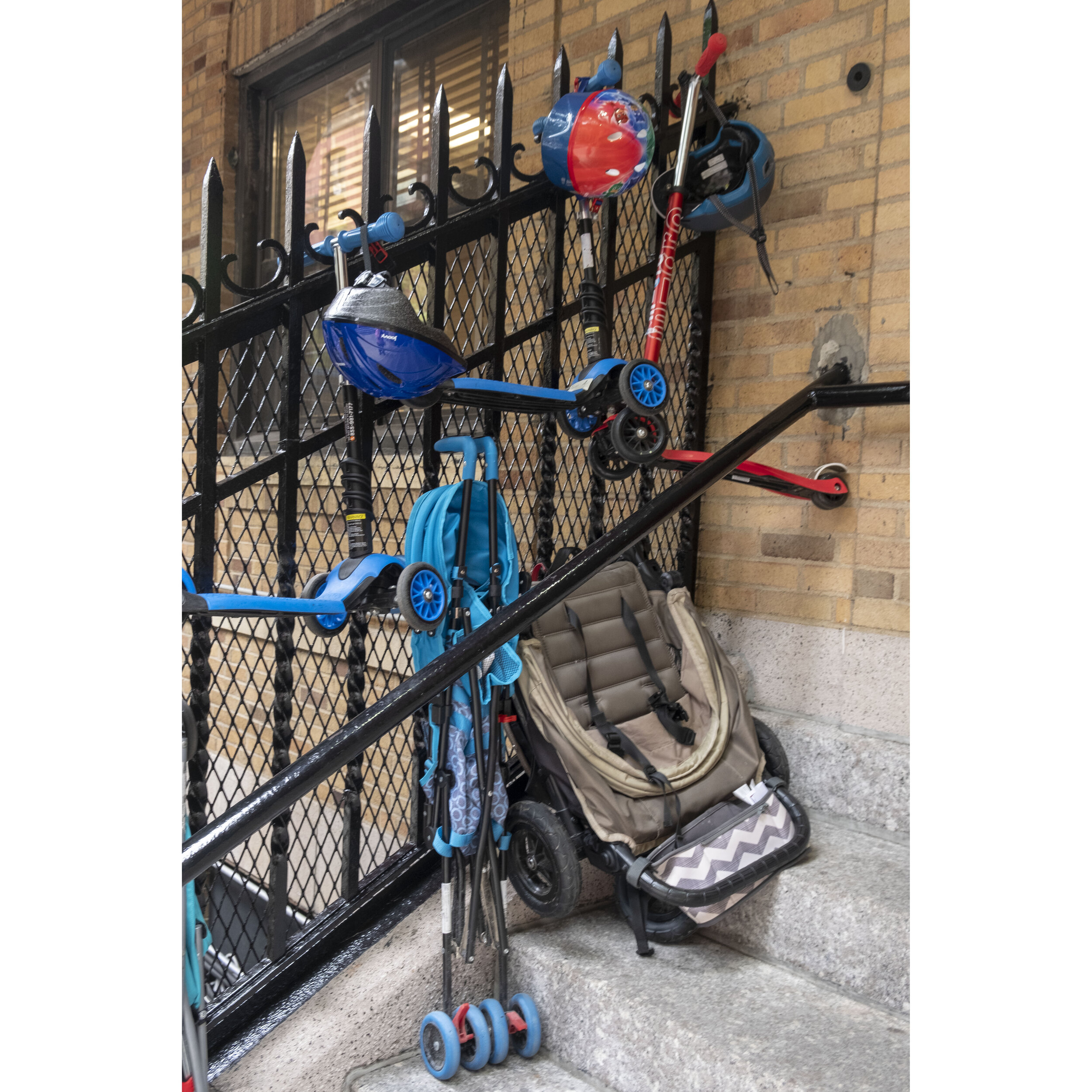 hanging scooters and stroller.jpg