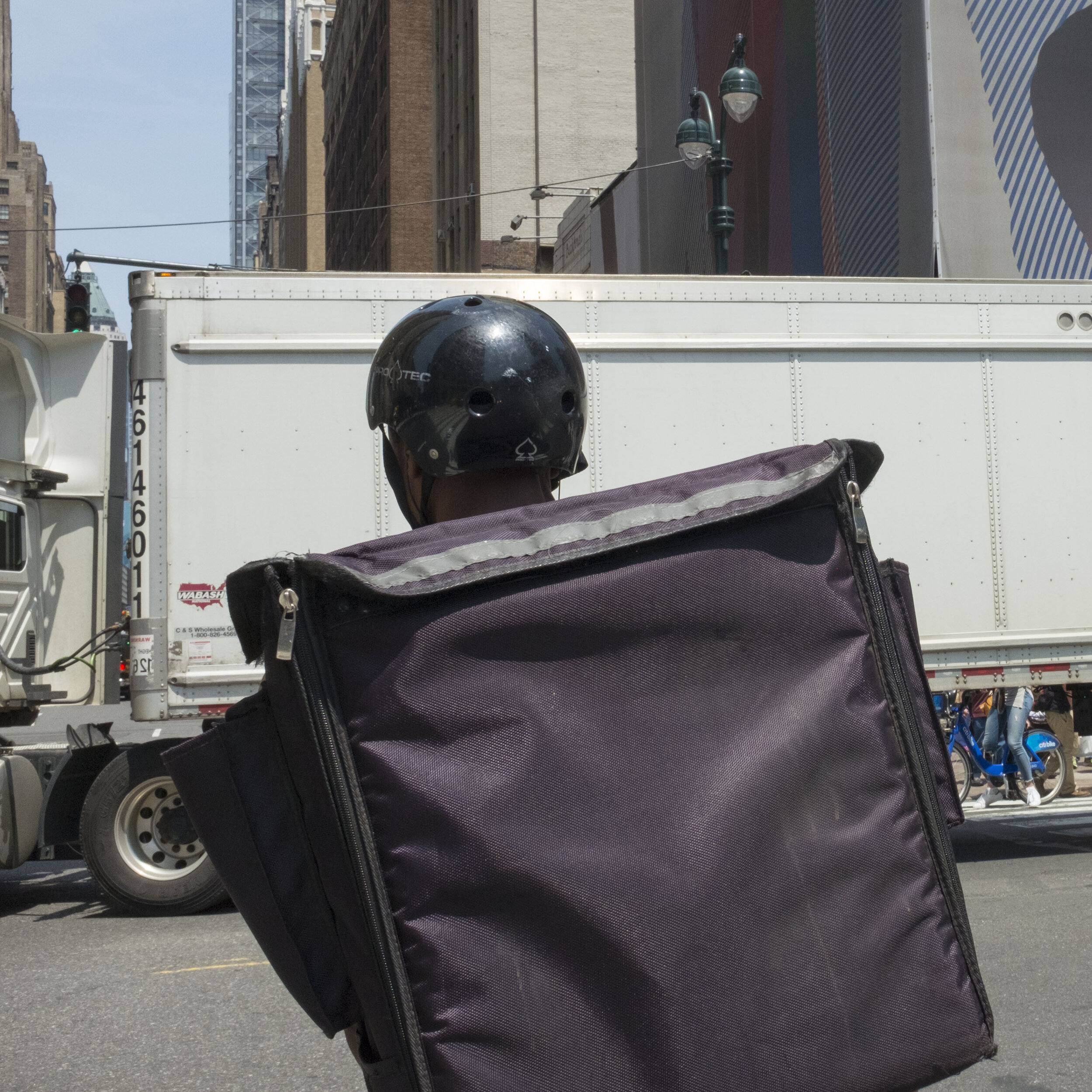 bicycle delivery with helmet.jpg