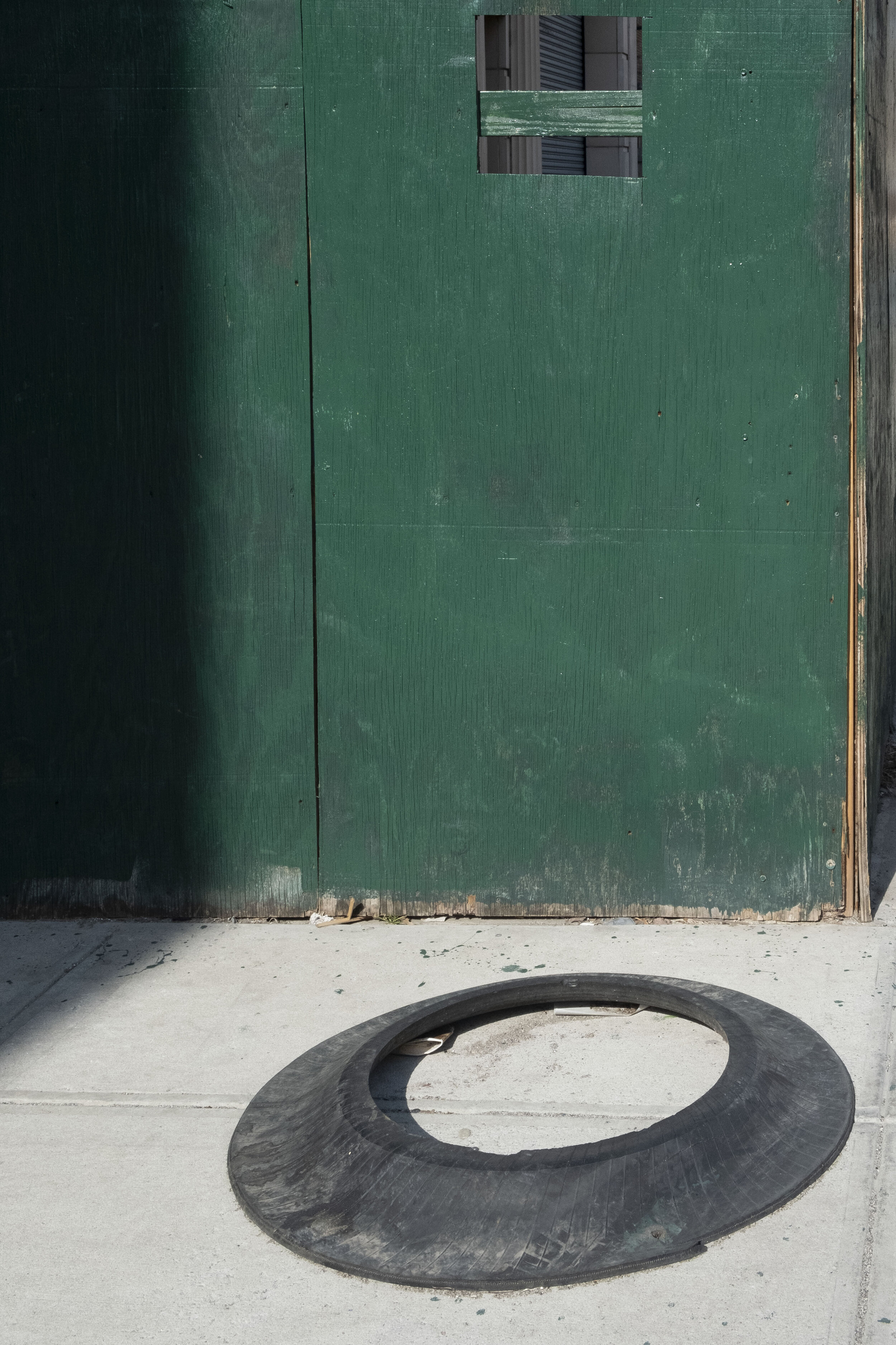 rubber ring and green fence.jpg