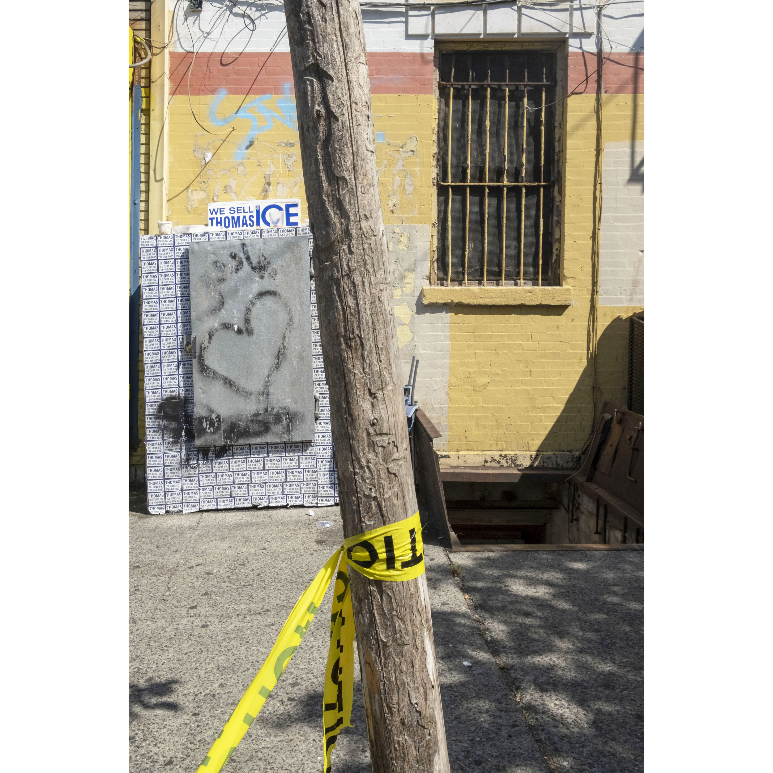 ice refrig with caution tape and tree wi day.jpg