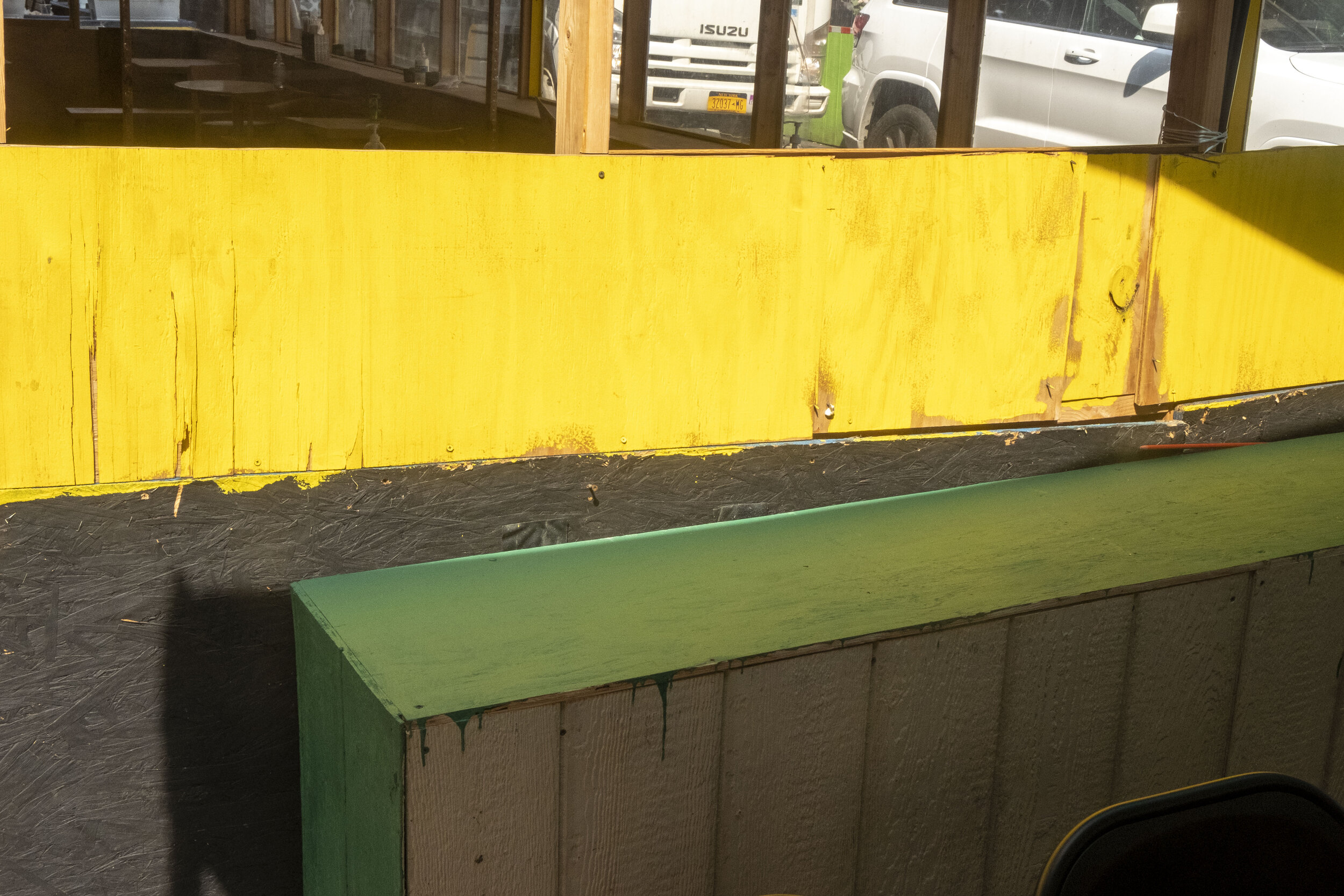 yellow and green sidewalk shed.jpg