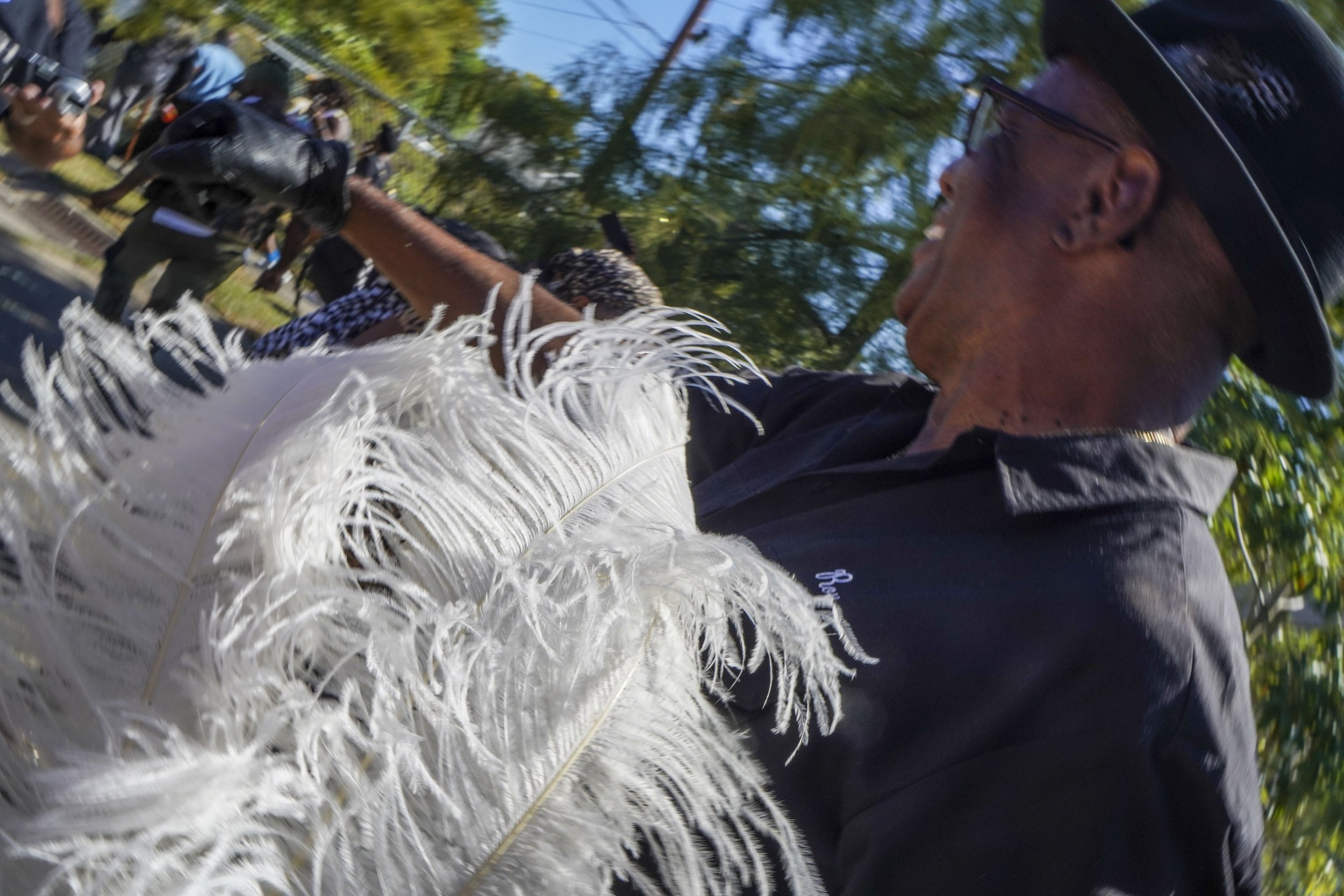 man w feather headdress.jpg