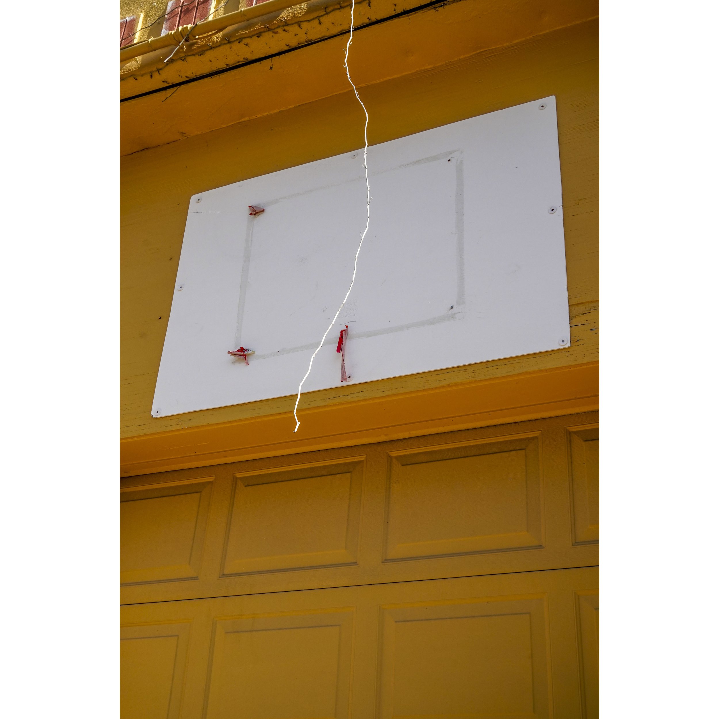 orange storefront with string hanging.jpg