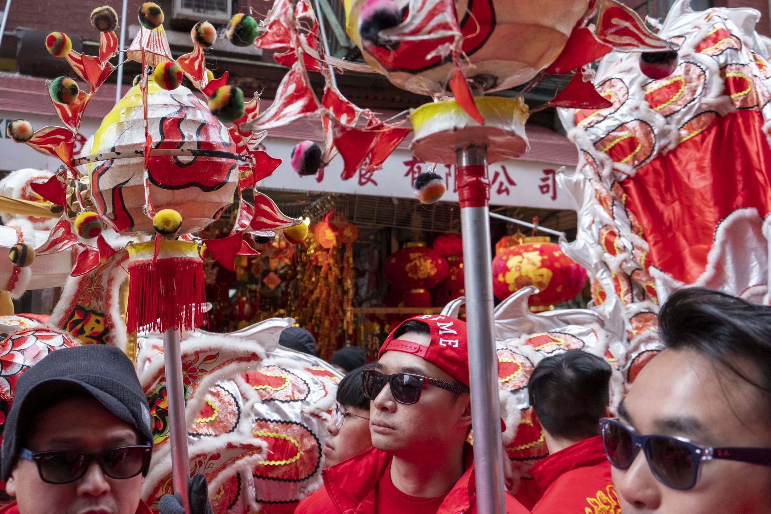 sun glass guys with red dragon floats.jpg