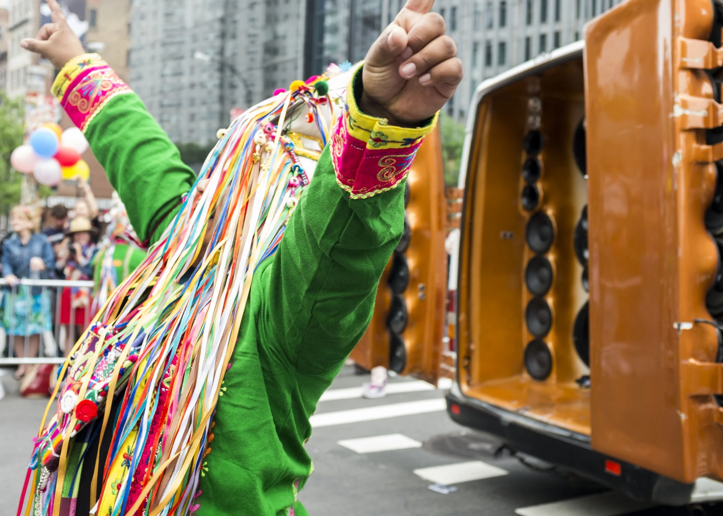 dancer with streamers and orange sound truck.jpg
