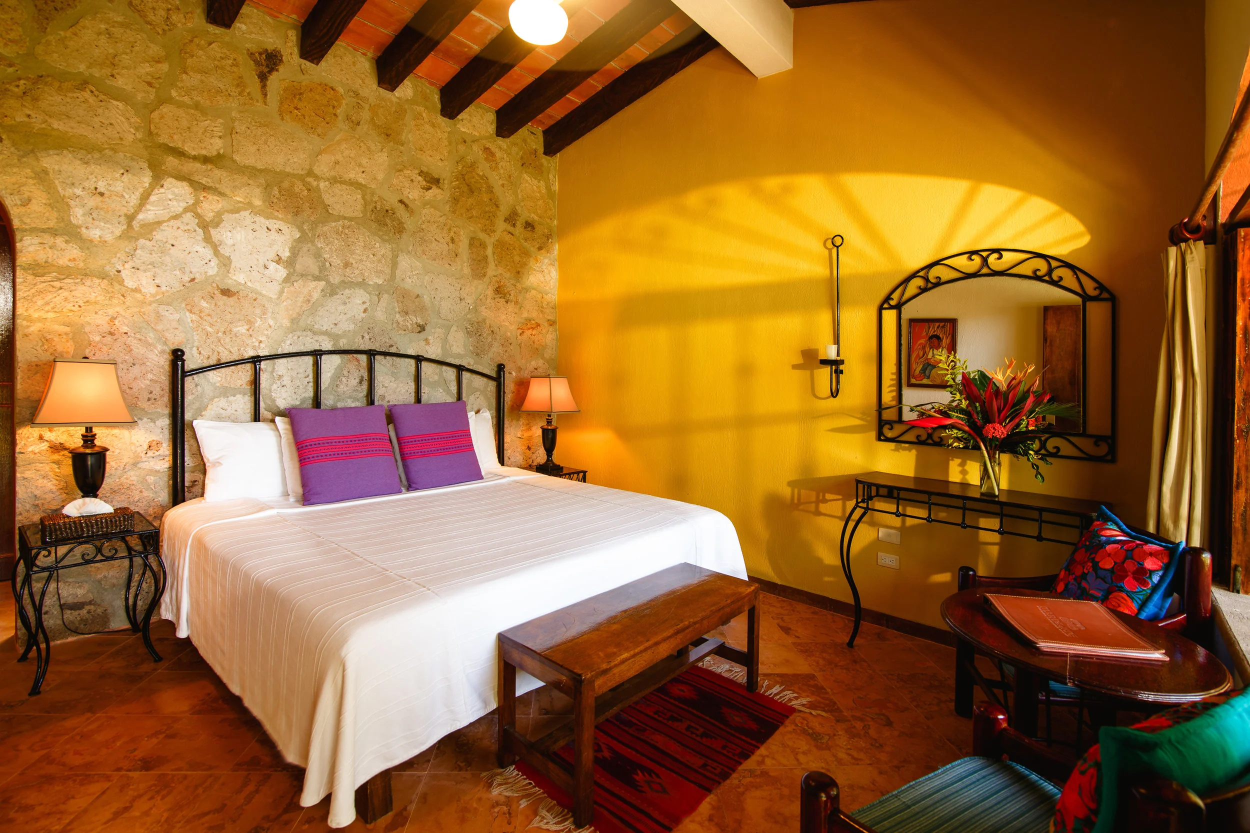 Garden Rooms are Mexican style, with natural rock walls and hand painted mosaics; or with an airy Mediterranean feel with floor-to-ceiling windows that let in plenty of natural light and fresh breeze. Each room has a spacious en-suite bathroom with natural bath amenities.