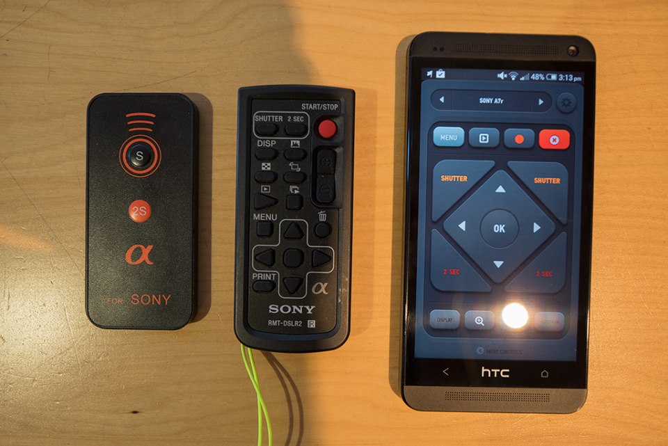 These are the three remotes I use. Left - Cheap ebay IR remote / Middle - Sony IR remote / Right - HTC One Smartphone with a built in IR blaster and custom remote app.