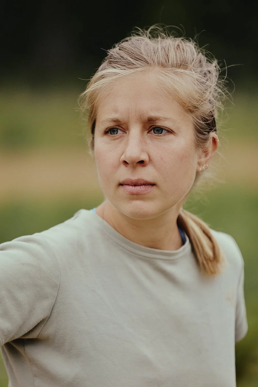 Lifestyle portrait of a woman farmer in North Carolina, shot by photographer Ian Mahathey
