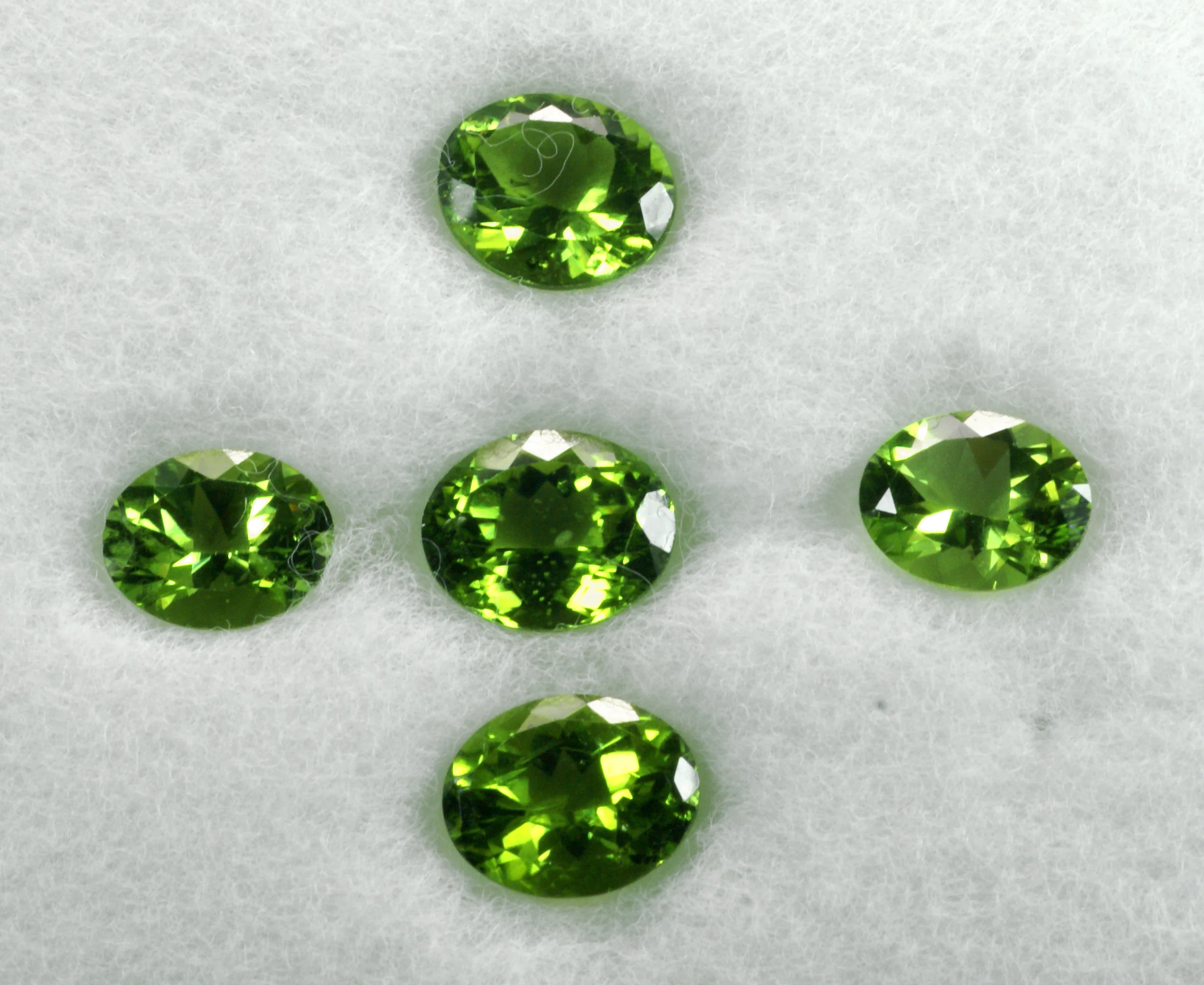 Peridots (faceted gems about 4 carats each)