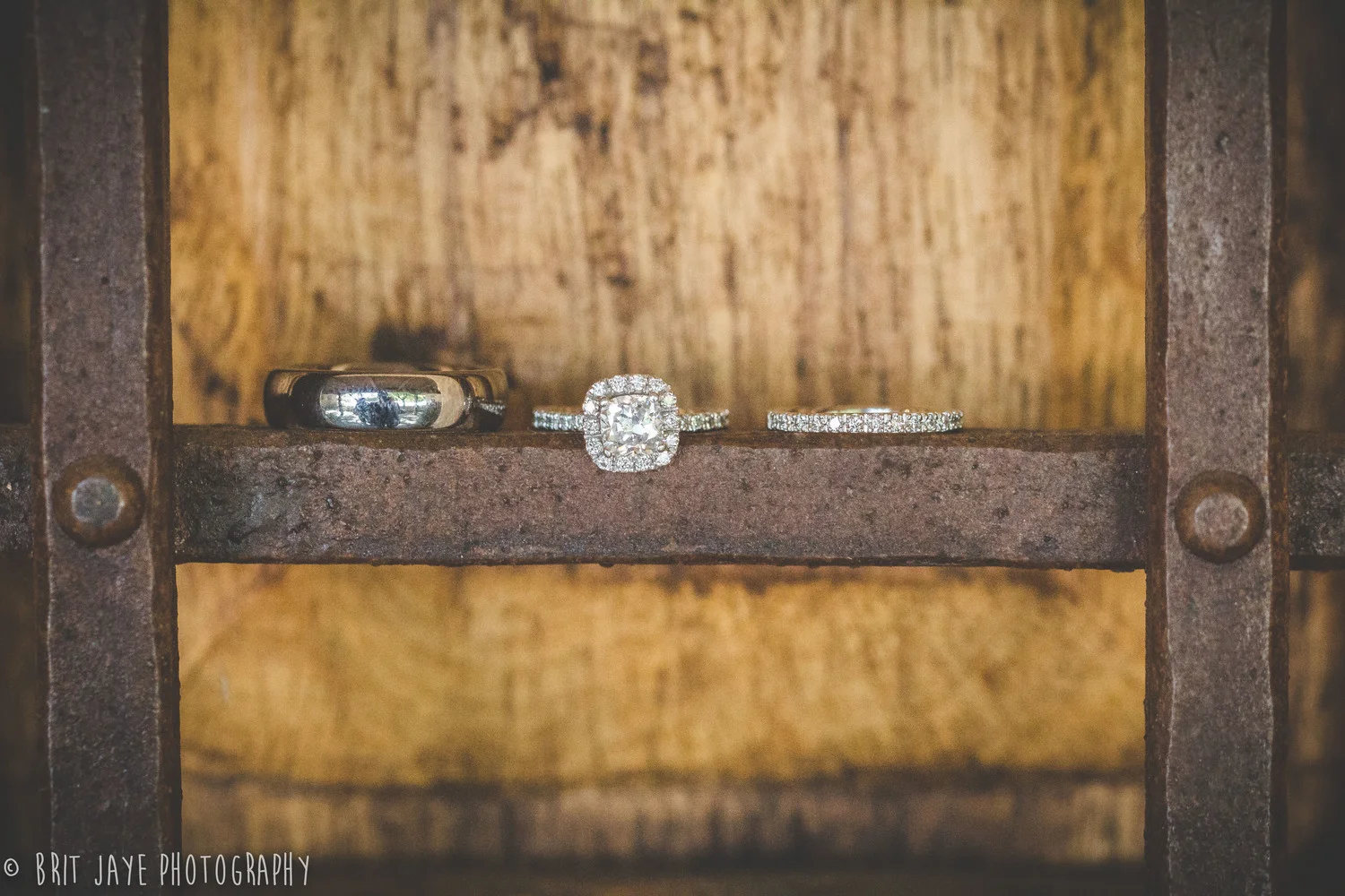SanDiegoweddingphotographyrusticringphoto.jpeg