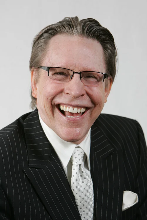 WaltherDarkSuitOpenSmile.jpg