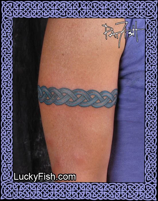 Her Celtic Wedding Band Tattoo