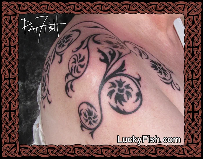 Tribal floral tattoo by Pat Fish