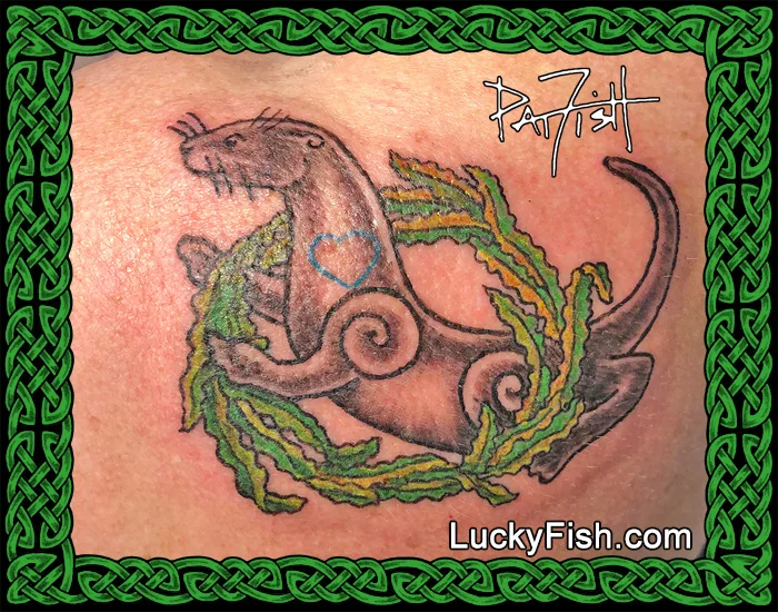Sea otter tattoo by Pat Fish