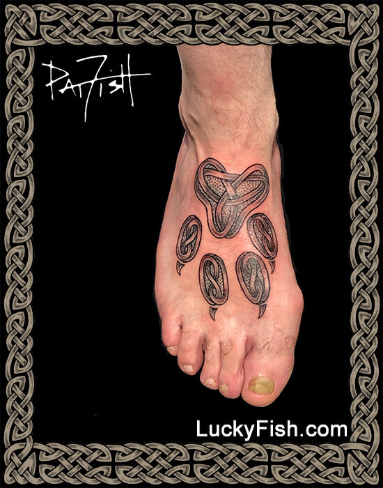 Celtic Wolf Paw Tattoo