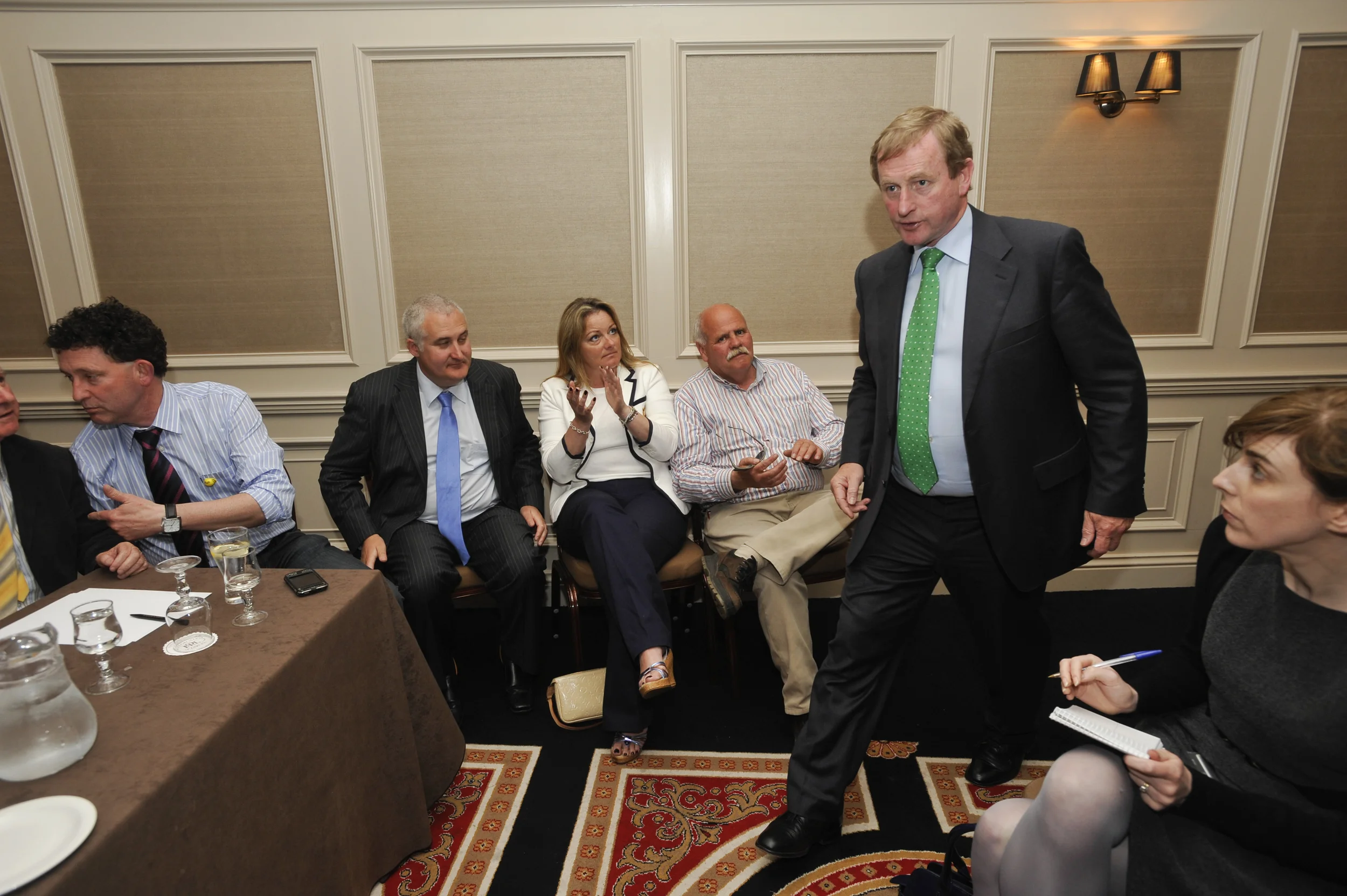 Fine Gael Enda Kenny arrives in the meeting room for a press conference during his visit to Ennis. Also in the picture are candidates Johnny Flynn, Roger Fox, Mary Howard and Tony Mulqueen.