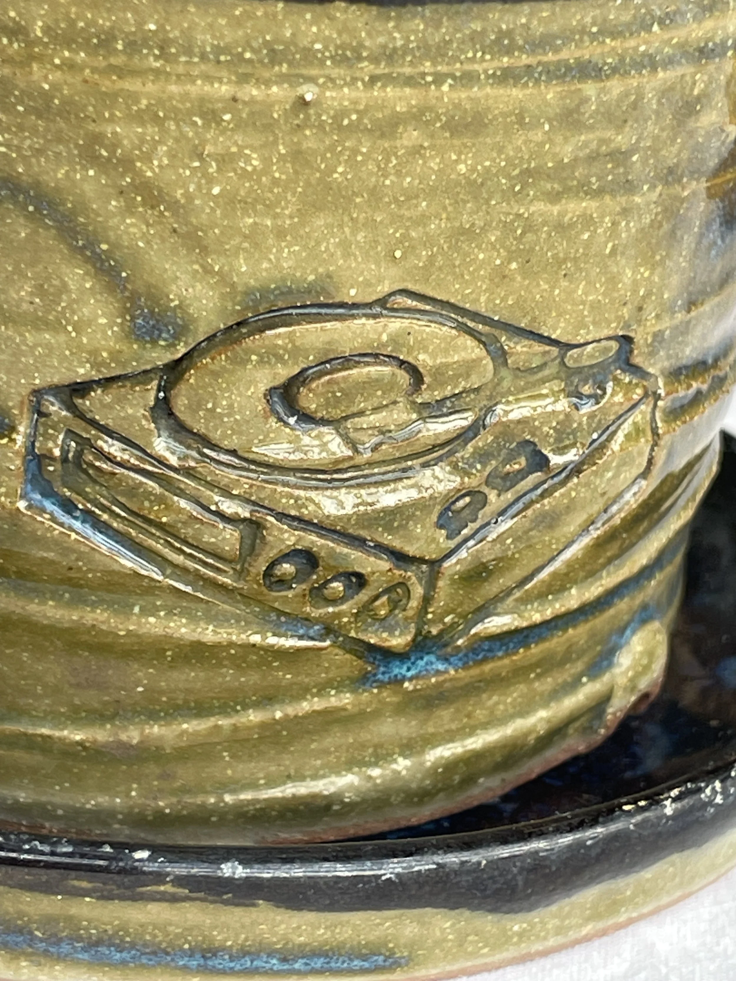 Grammotones logo planter with jade