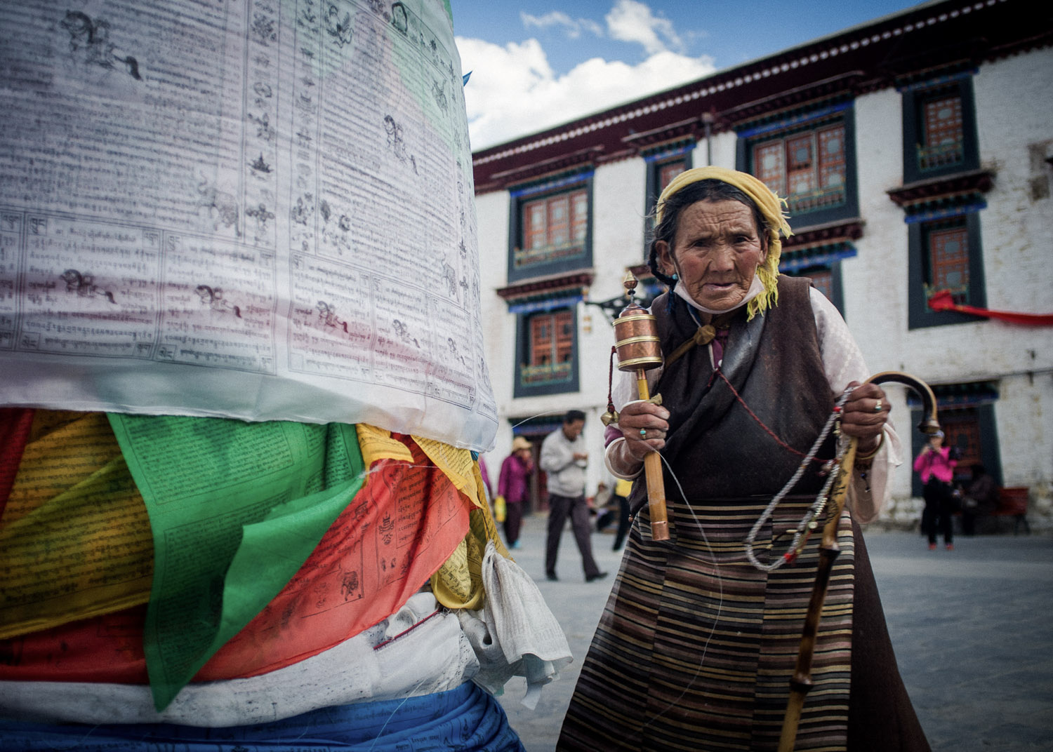 Woman with prayer wheel, Lhasa, Tibet.jpg