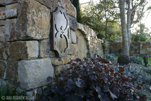 stone-entry-wall-with-custom-light-jones-newport-ridge-north.jpg