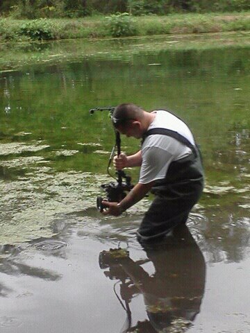 I wore waders to go in that water... shot upside down to get the lens closer to the water. I used the glide cam in case I fell in i could hold it over my head higher. 